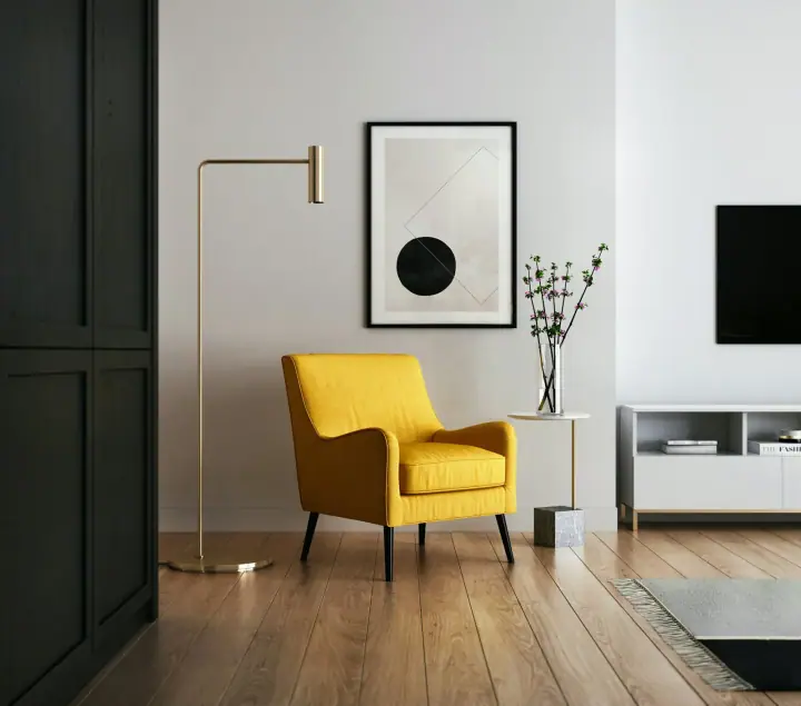 Minimalist studio corner with a yellow armchair